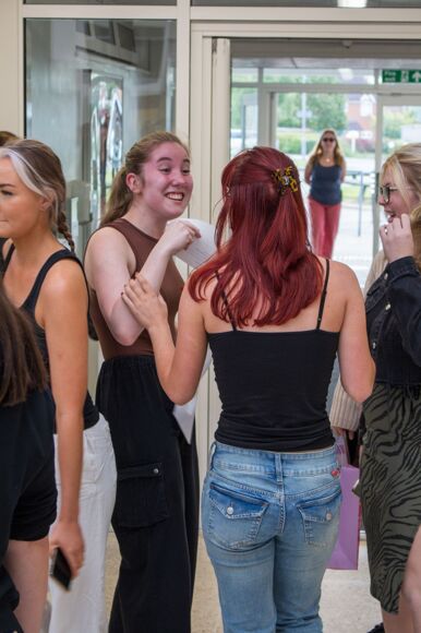 Happy students receiving results