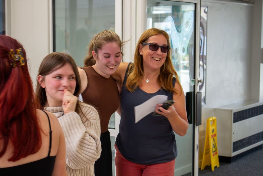 Student celebrates with parent