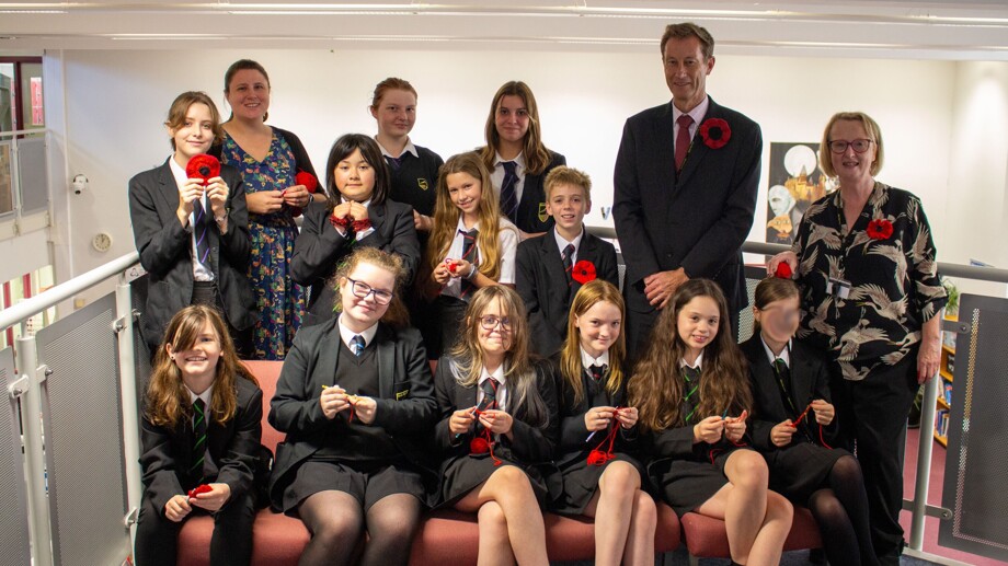 Crochet club students with staff